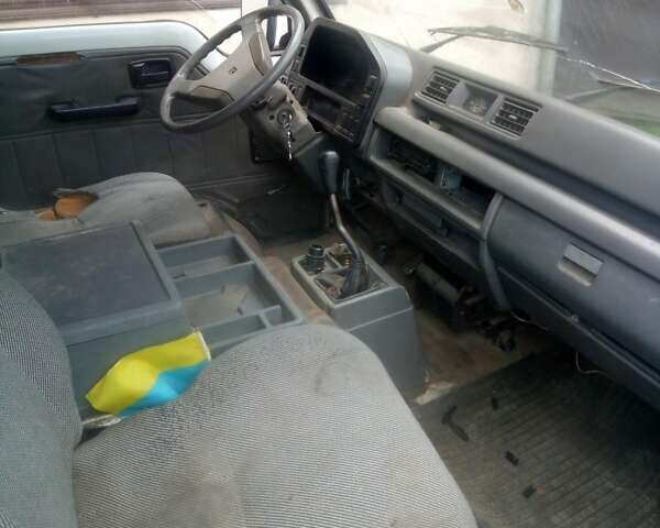 Белый Исузу Миди, объемом двигателя 2.38 л и пробегом 450 тыс. км за 1200 $, фото 7 на Automoto.ua