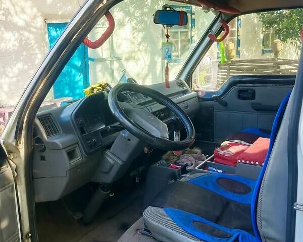 Белый Исузу Миди, объемом двигателя 2.2 л и пробегом 392 тыс. км за 2000 $, фото 2 на Automoto.ua