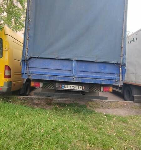 Синий Исузу НКР, объемом двигателя 4.57 л и пробегом 80 тыс. км за 11000 $, фото 2 на Automoto.ua