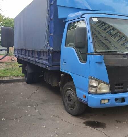 Синий Исузу НКР, объемом двигателя 4.57 л и пробегом 80 тыс. км за 11000 $, фото 1 на Automoto.ua