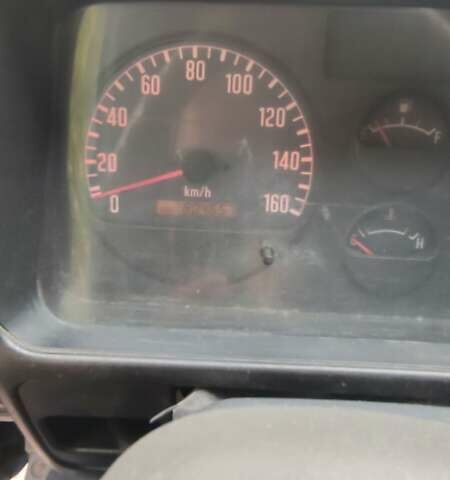 Синий Исузу НКР, объемом двигателя 4.57 л и пробегом 80 тыс. км за 11000 $, фото 4 на Automoto.ua