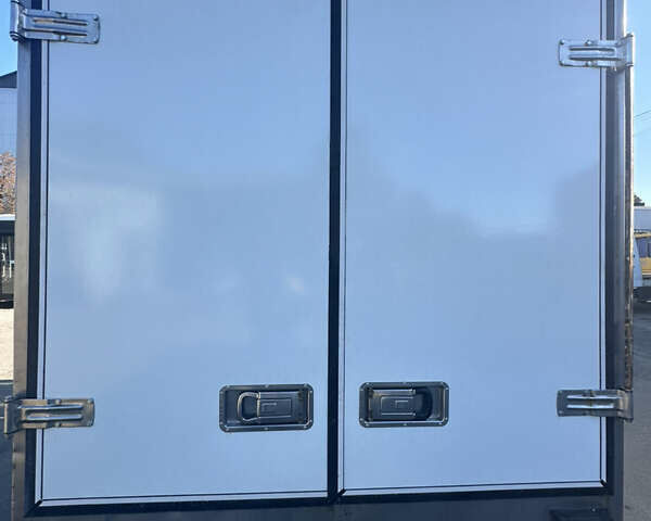 Синій Ісузу NLR, об'ємом двигуна 0 л та пробігом 490 тис. км за 11999 $, фото 3 на Automoto.ua
