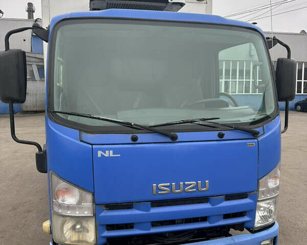 Синий Исузу НЛР, объемом двигателя 3 л и пробегом 490 тыс. км за 9800 $, фото 1 на Automoto.ua