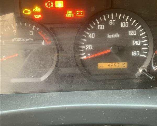 Білий Ісузу НМР, об'ємом двигуна 3 л та пробігом 429 тис. км за 10000 $, фото 5 на Automoto.ua