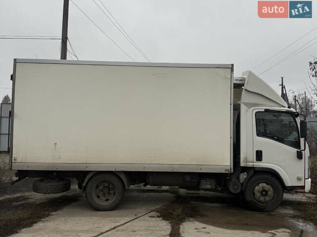 Білий Ісузу NPR, об'ємом двигуна 6 л та пробігом 301 тис. км за 17900 $, фото 2 на Automoto.ua