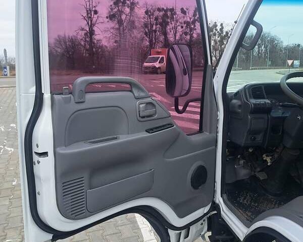 Белый Исузу НКР, объемом двигателя 4.57 л и пробегом 388 тыс. км за 13900 $, фото 22 на Automoto.ua