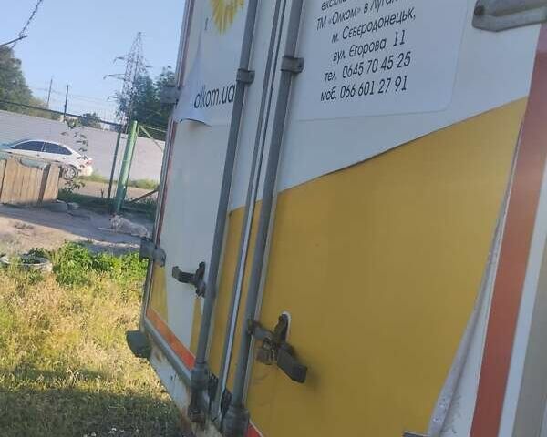 Белый Исузу НКР, объемом двигателя 4.6 л и пробегом 100 тыс. км за 7900 $, фото 3 на Automoto.ua