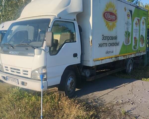 Белый Исузу НКР, объемом двигателя 4.6 л и пробегом 100 тыс. км за 7900 $, фото 2 на Automoto.ua
