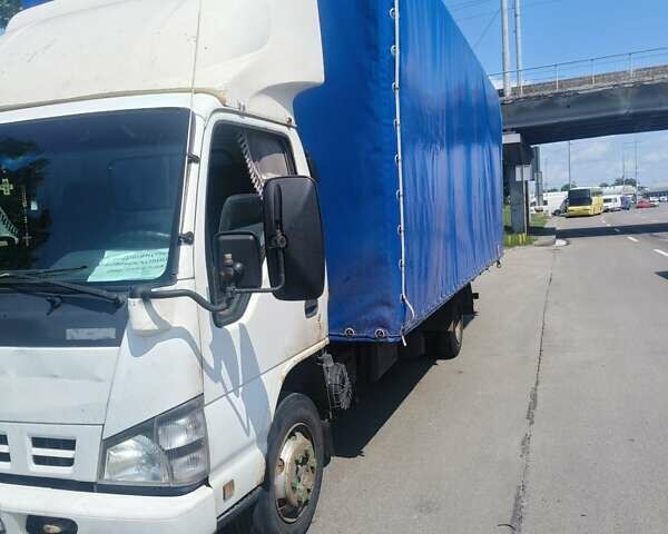 Белый Исузу НКР, объемом двигателя 4.57 л и пробегом 534 тыс. км за 8300 $, фото 1 на Automoto.ua