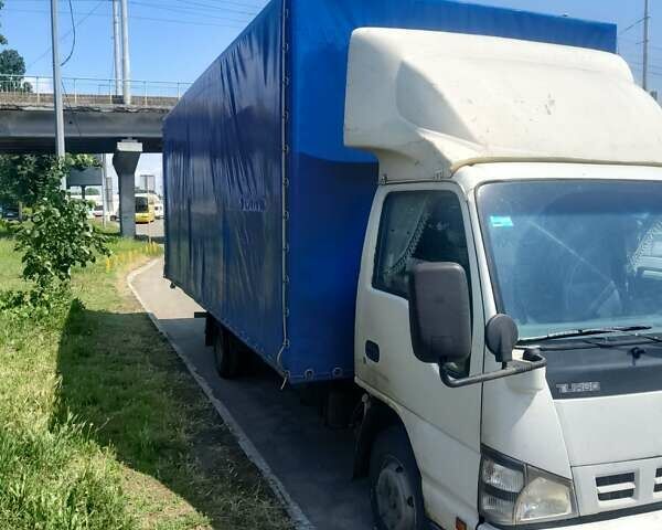 Белый Исузу НКР, объемом двигателя 4.57 л и пробегом 534 тыс. км за 8300 $, фото 2 на Automoto.ua