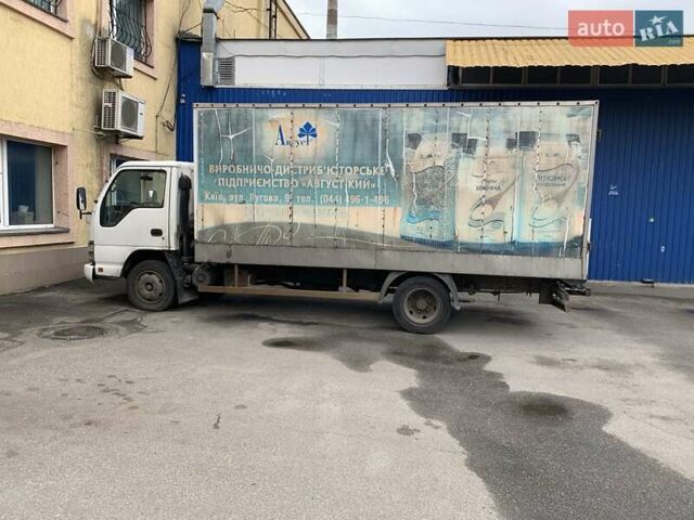 Белый Исузу НКР, объемом двигателя 4.57 л и пробегом 297 тыс. км за 7599 $, фото 4 на Automoto.ua