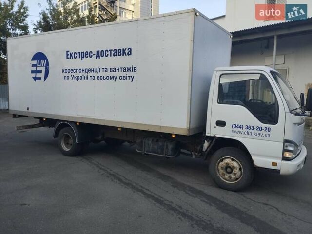 Белый Исузу НКР, объемом двигателя 4.57 л и пробегом 250 тыс. км за 10000 $, фото 4 на Automoto.ua
