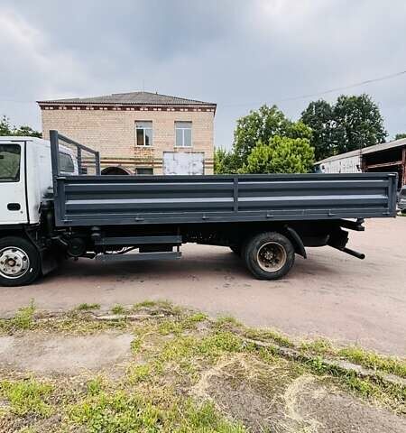 Белый Исузу НКР, объемом двигателя 4.6 л и пробегом 25 тыс. км за 12900 $, фото 1 на Automoto.ua
