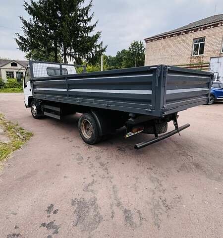 Белый Исузу НКР, объемом двигателя 4.6 л и пробегом 25 тыс. км за 12900 $, фото 2 на Automoto.ua