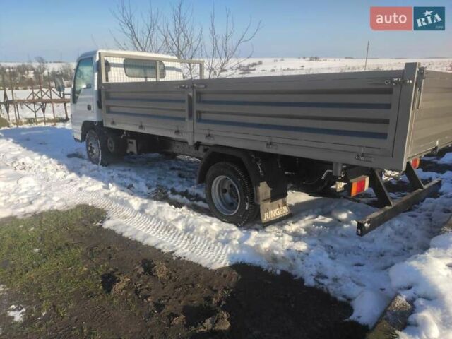 Белый Исузу НКР, объемом двигателя 4.57 л и пробегом 800 тыс. км за 16600 $, фото 9 на Automoto.ua