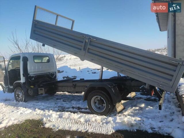 Белый Исузу НКР, объемом двигателя 4.57 л и пробегом 800 тыс. км за 16600 $, фото 5 на Automoto.ua