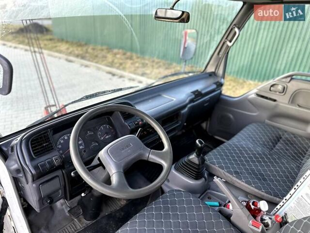Белый Исузу НКР, объемом двигателя 4.5 л и пробегом 207 тыс. км за 24600 $, фото 31 на Automoto.ua