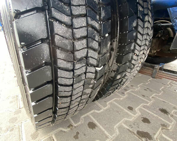 Желтый Исузу НКР, объемом двигателя 4.75 л и пробегом 356 тыс. км за 11999 $, фото 5 на Automoto.ua