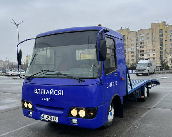 Желтый Исузу НКР, объемом двигателя 4.75 л и пробегом 356 тыс. км за 11999 $, фото 1 на Automoto.ua