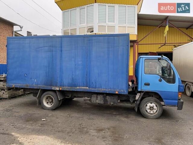 Синий Исузу НКР, объемом двигателя 5.19 л и пробегом 740 тыс. км за 6000 $, фото 1 на Automoto.ua