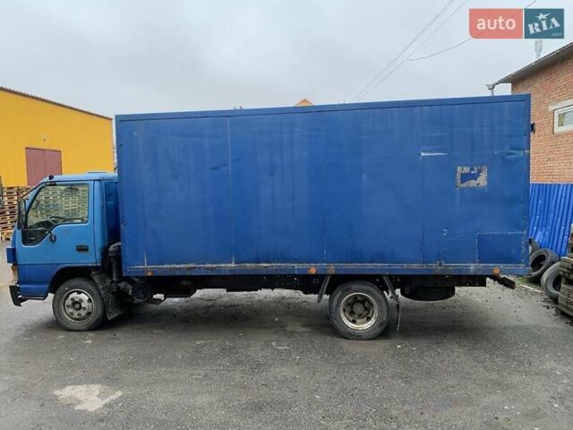 Синий Исузу НКР, объемом двигателя 5.19 л и пробегом 740 тыс. км за 6000 $, фото 2 на Automoto.ua