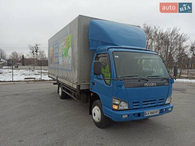 Синий Исузу НКР, объемом двигателя 4.57 л и пробегом 500 тыс. км за 11800 $, фото 1 на Automoto.ua