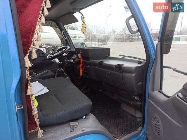Синий Исузу НКР, объемом двигателя 4.57 л и пробегом 500 тыс. км за 11800 $, фото 7 на Automoto.ua