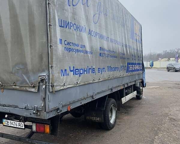 Синий Исузу НКР, объемом двигателя 5.2 л и пробегом 944 тыс. км за 7000 $, фото 3 на Automoto.ua