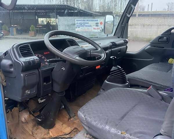 Синий Исузу НКР, объемом двигателя 5.2 л и пробегом 944 тыс. км за 7000 $, фото 8 на Automoto.ua