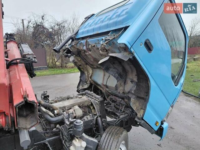 Синий Исузу НКР, объемом двигателя 4.7 л и пробегом 498 тыс. км за 23500 $, фото 24 на Automoto.ua