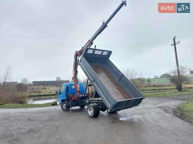 Синий Исузу НКР, объемом двигателя 4.7 л и пробегом 498 тыс. км за 23500 $, фото 4 на Automoto.ua