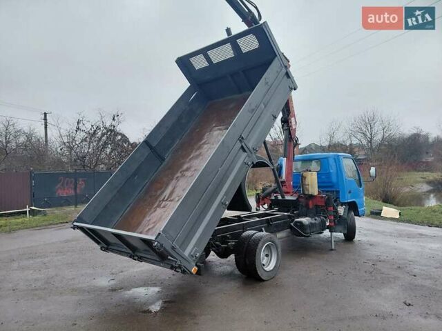 Синий Исузу НКР, объемом двигателя 4.7 л и пробегом 498 тыс. км за 23500 $, фото 3 на Automoto.ua