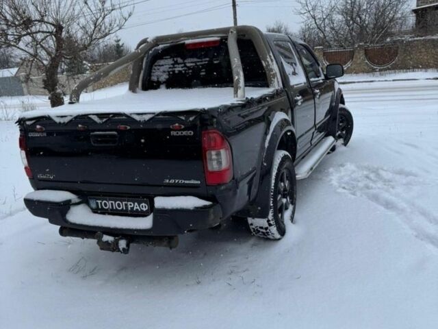 Чорний Ісузу Rodeo, об'ємом двигуна 3 л та пробігом 210 тис. км за 4600 $, фото 2 на Automoto.ua