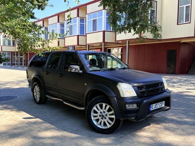 Чорний Ісузу Rodeo, об'ємом двигуна 3 л та пробігом 205 тис. км за 4741 $, фото 3 на Automoto.ua