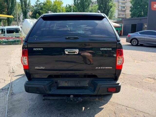 Черный Исузу Родео, объемом двигателя 2.5 л и пробегом 122 тыс. км за 5000 $, фото 4 на Automoto.ua