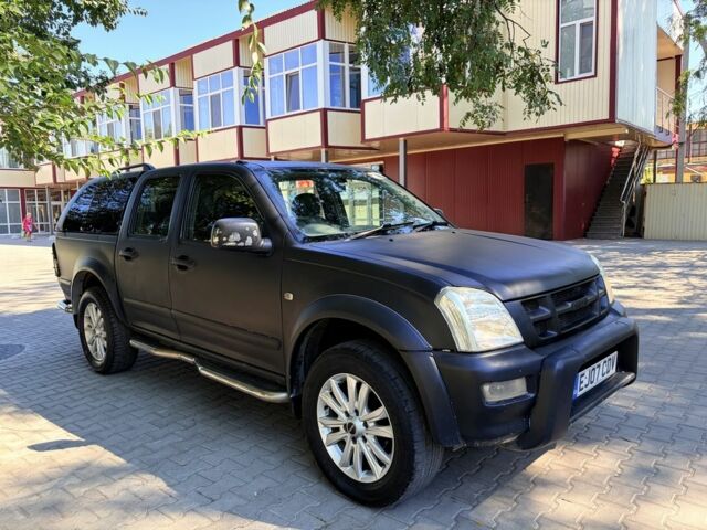 Чорний Ісузу Rodeo, об'ємом двигуна 3 л та пробігом 205 тис. км за 4741 $, фото 4 на Automoto.ua
