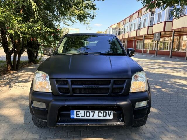 Чорний Ісузу Rodeo, об'ємом двигуна 3 л та пробігом 205 тис. км за 4741 $, фото 2 на Automoto.ua