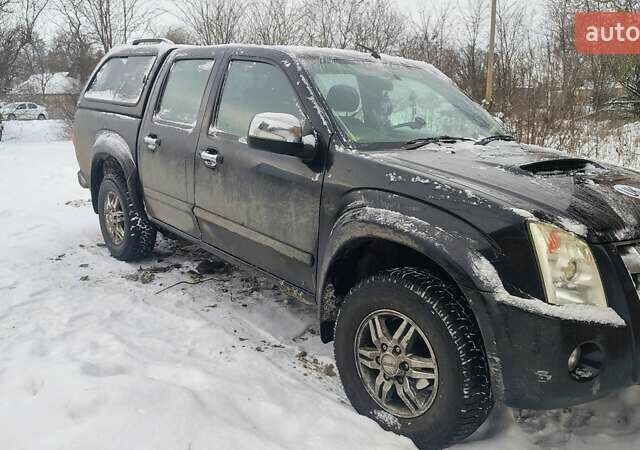 Черный Исузу Родео, объемом двигателя 2.5 л и пробегом 200 тыс. км за 4700 $, фото 2 на Automoto.ua