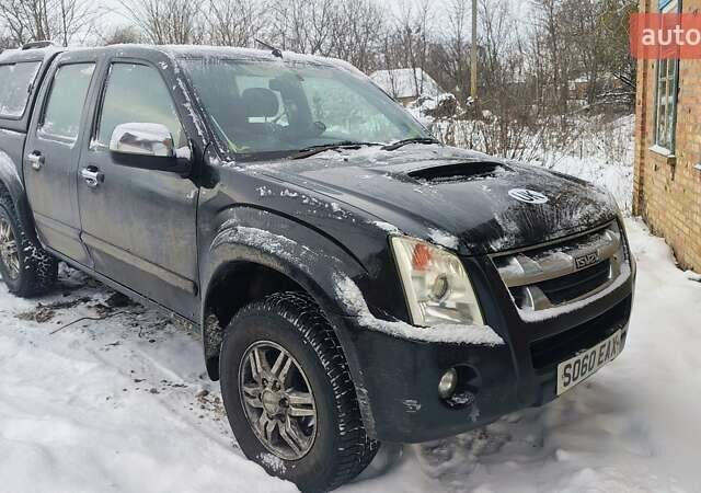 Черный Исузу Родео, объемом двигателя 2.5 л и пробегом 200 тыс. км за 4700 $, фото 1 на Automoto.ua