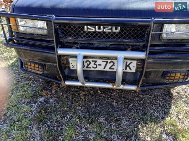 Чорний Ісузу Rodeo, об'ємом двигуна 3 л та пробігом 152 тис. км за 1600 $, фото 2 на Automoto.ua