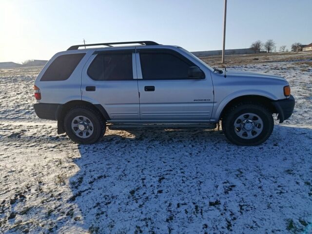 Серый Исузу Родео, объемом двигателя 2.2 л и пробегом 169 тыс. км за 3500 $, фото 2 на Automoto.ua