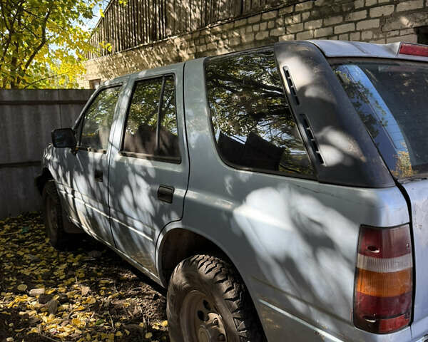 Синий Исузу Родео, объемом двигателя 2.6 л и пробегом 300 тыс. км за 1385 $, фото 5 на Automoto.ua