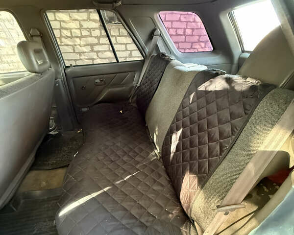 Синий Исузу Родео, объемом двигателя 2.6 л и пробегом 300 тыс. км за 1385 $, фото 4 на Automoto.ua