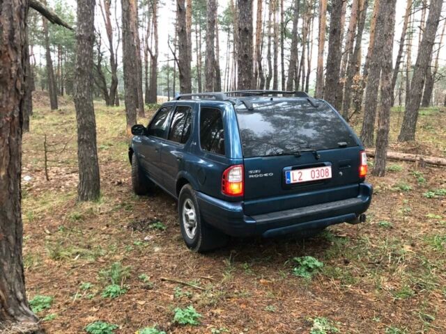 Синій Ісузу Rodeo, об'ємом двигуна 3.2 л та пробігом 200 тис. км за 1400 $, фото 5 на Automoto.ua