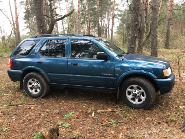 Синій Ісузу Rodeo, об'ємом двигуна 3.2 л та пробігом 200 тис. км за 1400 $, фото 4 на Automoto.ua