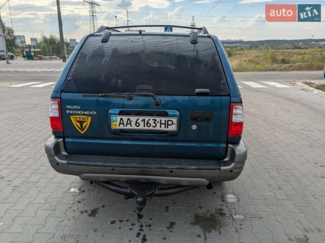 Синій Ісузу Rodeo, об'ємом двигуна 3.2 л та пробігом 288 тис. км за 6500 $, фото 3 на Automoto.ua