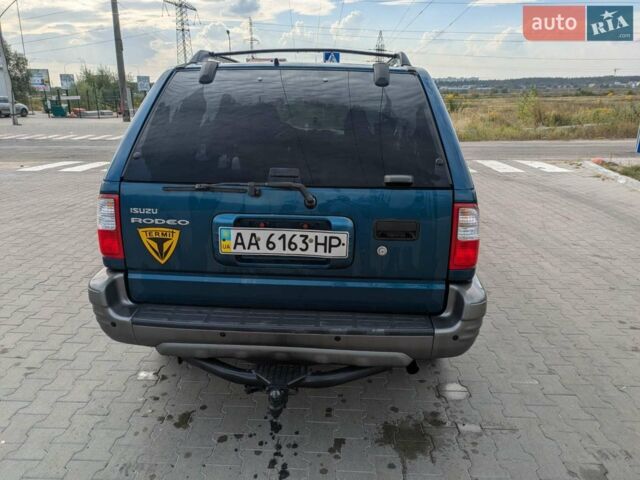 Синий Исузу Родео, объемом двигателя 3.2 л и пробегом 288 тыс. км за 6500 $, фото 3 на Automoto.ua
