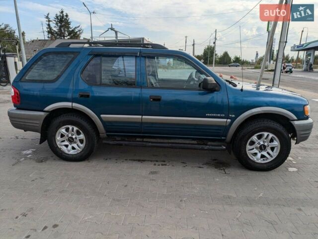 Синій Ісузу Rodeo, об'ємом двигуна 3.2 л та пробігом 288 тис. км за 6500 $, фото 4 на Automoto.ua