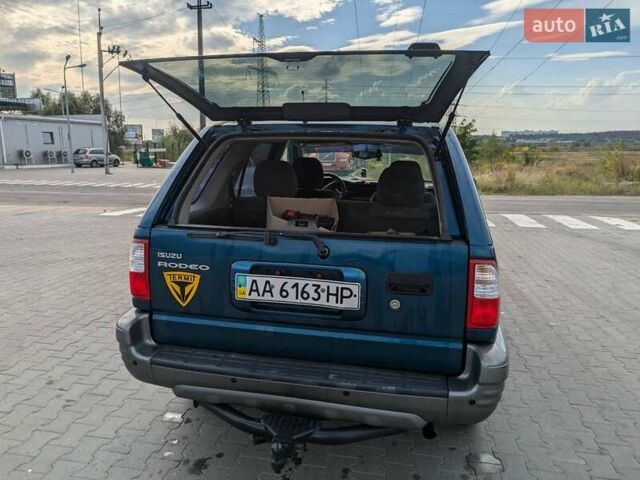 Синий Исузу Родео, объемом двигателя 3.2 л и пробегом 288 тыс. км за 6500 $, фото 3 на Automoto.ua