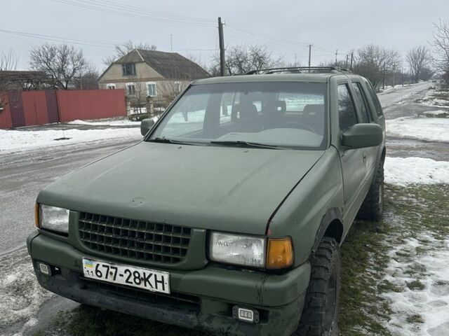 Зеленый Исузу Родео, объемом двигателя 3.2 л и пробегом 200 тыс. км за 2300 $, фото 1 на Automoto.ua